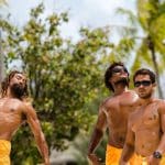 three topless men